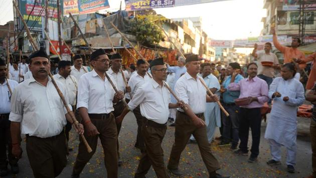 Rashtriya Swayamsevak Sangh (RSS) volunteers march along a road during an event to mark the Hindu New Year in Allahabad on Sunday. (Sanjay Kanojia / AFP) Rashtriya Swayamsevak Sangh (RSS) volunteers march along a road during an event to mark the Hindu New Year in Allahabad on Sunday. (Sanjay Kanojia / AFP)