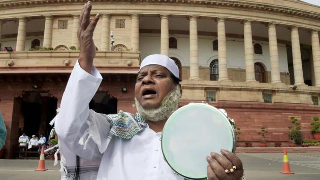 His various avatars to register a demand for special status for Andhra Pradesh also brought him dressed as religious figures, seen as a Muslim cleric here. Similarly, earlier this month, he arrived dressed as Lord Krishna and played the flute outside the Parliament. (Shahbaz Khan / PTI) 