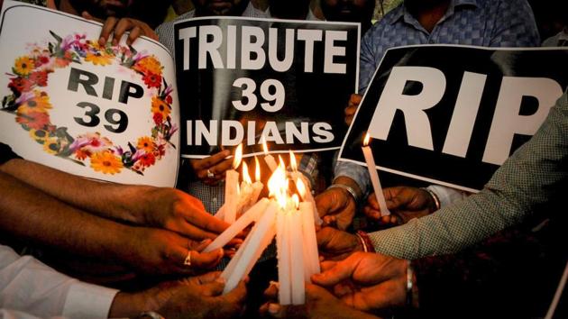 Activists light candles to pay tributes to the 39 Indian workers who were killed in Iraq. (PTI File Photo) Activists light candles to pay tributes to the 39 Indian workers who were killed in Iraq. (PTI File Photo)