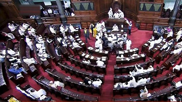 Opposition members protest during the on-going budget session of Rajya Sabha, at Parliament House in New Delhi on Monday. (PTI Photo) Opposition members protest during the on-going budget session of Rajya Sabha, at Parliament House in New Delhi on Monday. (PTI Photo)