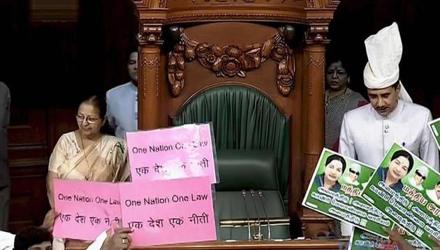 Lok Sabha Speaker Sumitra Mahajan arrives in the Lok Sabha as TRS and AIADMK members display placards. (PTI photo) Lok Sabha Speaker Sumitra Mahajan arrives in the Lok Sabha as TRS and AIADMK members display placards. (PTI photo)