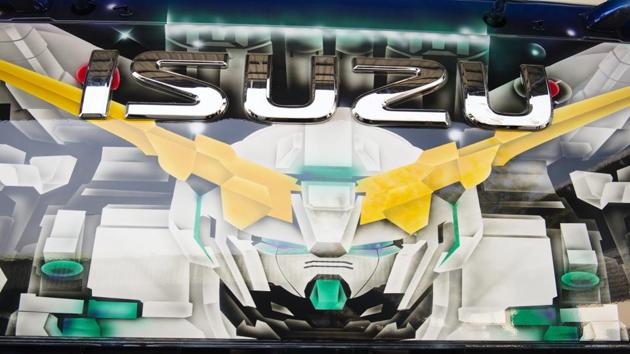 A Transformer-inspired detail on a painted truck at the Soonchai Industry workshop in Nakhon Pathom, Thailand. When the trucks are “nicely decorated, drivers are motivated to be extra careful and not to leave any scratches on them,” Sirintra said. Thailand’s lavish vehicle decoration originated with bus paintings - and the Michelin Man. (Lillian Suwanrumpha / AFP)