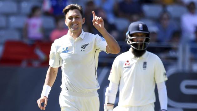New Zealand's Trent Boult celebrates his fifth wicket after dismissing England's Chris Woakes during their first cricket Test in Auckland, New Zealand, Thursday.(AP)