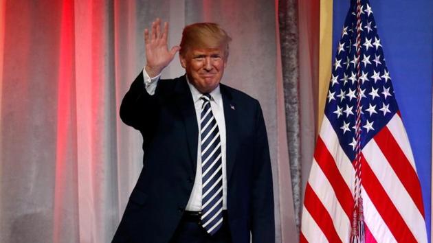 US President Donald Trump waves to the crowd before delivering remarks at the National Republican Congressional Committee's annual March dinner at the National Building Museum in Washington, US on March 20. (REUTERS) US President Donald Trump waves to the crowd before delivering remarks at the National Republican Congressional Committee's annual March dinner at the National Building Museum in Washington, US on March 20. (REUTERS)