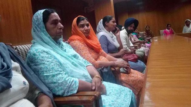 Family members of those killed in Iraq in Baba Bakala on Friday.(HT Photo) Family members of those killed in Iraq in Baba Bakala on Friday.(HT Photo)