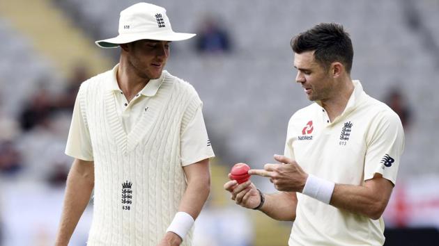 England's Stuart Broad, left and James Anderson discuss the pink ball during their first Test against New Zealand in Auckland. (AP) England's Stuart Broad, left and James Anderson discuss the pink ball during their first Test against New Zealand in Auckland. (AP)