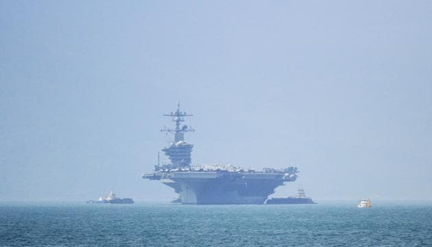 The USS Carl Vinson (CVN-70), the US Navy's nuclear-powered Nimitz-class aircraft carrier, pulls into port in Danang on March 5, 2018. (AFP) The USS Carl Vinson (CVN-70), the US Navy's nuclear-powered Nimitz-class aircraft carrier, pulls into port in Danang on March 5, 2018. (AFP)