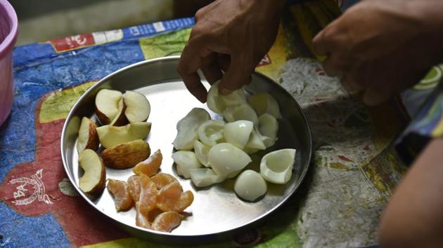 Dhiren Singh (pictured) is one of the jawans training for the national championship. He complements rigorous hours in the gym with 20 eggs, a boiled chicken and fruit every day post practice. Mamota, no longer an active contestant herself, is particular about their diet-- ensuring the jawans don’t overshoot their weight classes when it’s showtime. (Raj K Raj / HT Photo) Dhiren Singh (pictured) is one of the jawans training for the national championship. He complements rigorous hours in the gym with 20 eggs, a boiled chicken and fruit every day post practice. Mamota, no longer an active contestant herself, is particular about their diet-- ensuring the jawans don’t overshoot their weight classes when it’s showtime. (Raj K Raj / HT Photo)