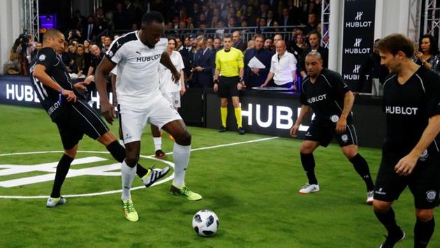 Usain Bolt plays football with David Trezeguet, Roberto Carlos and Gaizka Mendieta during a recent exhibition match in Basel, Switzerland. (REUTERS) Usain Bolt plays football with David Trezeguet, Roberto Carlos and Gaizka Mendieta during a recent exhibition match in Basel, Switzerland. (REUTERS)
