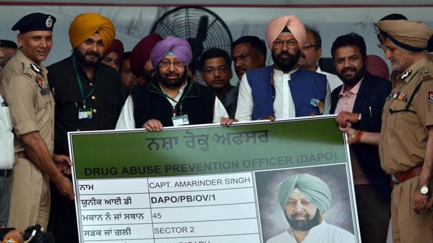 Leading the campaign, Amarinder became the state’s first DAPO (Drug Abuse Prevention Officer) , with STF chief Harpreet Singh Sidhu handing over the DAPO Identity Card to him at Khatkar Kalan, the ancestral village of Shaheed-e-Azam Bhagat Singh (Pardeep Pandit/HT) Leading the campaign, Amarinder became the state’s first DAPO (Drug Abuse Prevention Officer) , with STF chief Harpreet Singh Sidhu handing over the DAPO Identity Card to him at Khatkar Kalan, the ancestral village of Shaheed-e-Azam Bhagat Singh (Pardeep Pandit/HT)