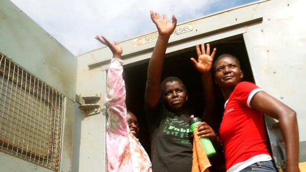 Female prisoners bid goodbye from the back of a prison’s truck as they were released from the prison. The ZPCS said that after releasing about 3,000 prisoners, the prison population will come down to 17,000. The last time that prisoners were released en masse was in May 2016 by former president Robert Mugabe when prisons were struggling to feed inmates due to lack of funding from the government. (Philimon Bulawayo / REUTERS)