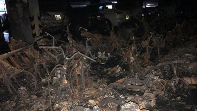 Motorbikes are seen burned down in a parking lot after a fire broke out in an apartment block in Ho Chi Minh City, Vietnam, on Friday. (Reuters Photo) Motorbikes are seen burned down in a parking lot after a fire broke out in an apartment block in Ho Chi Minh City, Vietnam, on Friday. (Reuters Photo)