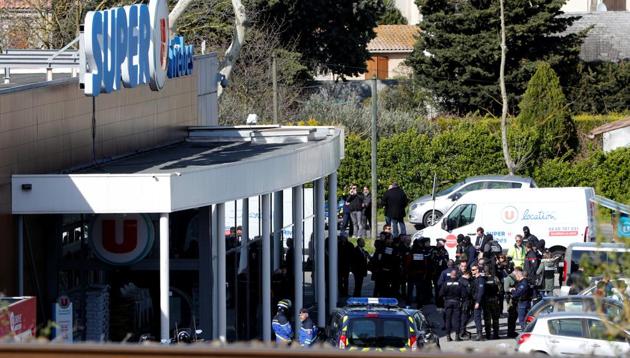 Police officers at a supermarket in Trebes where a gunman took people hostage on Friday. (Reuters) Police officers at a supermarket in Trebes where a gunman took people hostage on Friday. (Reuters)