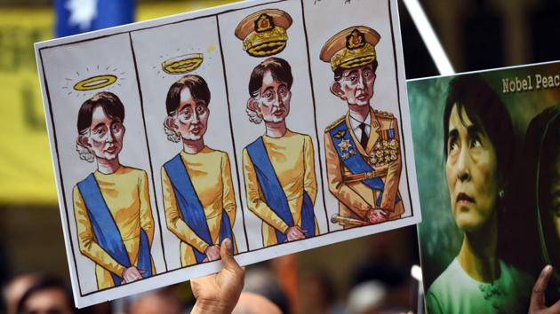 Posters referring to Myanmar's State Counselor Aung San Suu Kyi are displayed at a protest during the ASEAN-Australia Special Summit in Sydney on March 17, 2018. (William West / AFP) Posters referring to Myanmar's State Counselor Aung San Suu Kyi are displayed at a protest during the ASEAN-Australia Special Summit in Sydney on March 17, 2018. (William West / AFP)