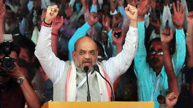 BJP president Amit Shah addresses a meeting of the party's booth presidents in the view for the upcoming panchayat polls, in Guwahati on Saturday. (PTI Photo) BJP president Amit Shah addresses a meeting of the party's booth presidents in the view for the upcoming panchayat polls, in Guwahati on Saturday. (PTI Photo)