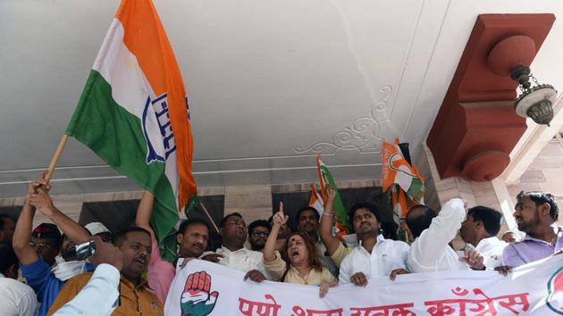 Members of Youth Congress protest against the new proposed parking policy. (Pratham Gokhale/HT Photo)