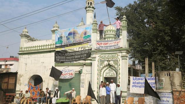 People protest on the anniversary of Babri Masjid demolition, in Ayodhya. (PTI File Photo) People protest on the anniversary of Babri Masjid demolition, in Ayodhya. (PTI File Photo)