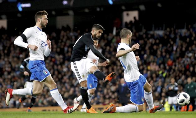 Argentina's Ever Banega, centre, scores his side's first goal of the game during the international friendly football match against Italy at the Etihad Stadium in Manchester on Friday. (AP) Argentina's Ever Banega, centre, scores his side's first goal of the game during the international friendly football match against Italy at the Etihad Stadium in Manchester on Friday. (AP)