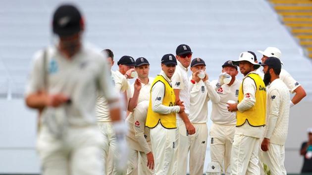 England's captain Joe Root watches with team mates New Zealand's captain Kane Williamson walking off the ground after being dismissed LBW during the second day of the first Test between New Zealand and England at Eden Park, Auckland, New Zealand, on March 23, 2018. (REUTERS) England's captain Joe Root watches with team mates New Zealand's captain Kane Williamson walking off the ground after being dismissed LBW during the second day of the first Test between New Zealand and England at Eden Park, Auckland, New Zealand, on March 23, 2018. (REUTERS)