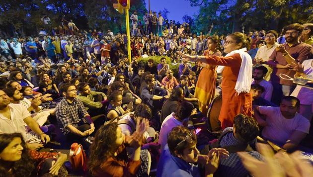 JNU students at a protest over the issue of compulsory attendance in New Delhi on Friday.(PTI Photo)