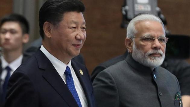 Chinese President Xi Jinping and Prime Minister Narendra Modi on the sidelines of the 2017 BRICS Summit in Xiamen, Fujian province, China, September 5, 2017.(Reuters File Photo)