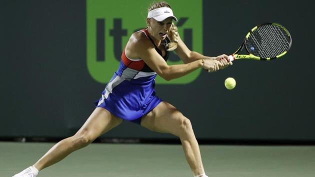 Caroline Wozniacki hits a backhand against Monica Puig on day four of the Miami Open. (USA TODAY Sports) Caroline Wozniacki hits a backhand against Monica Puig on day four of the Miami Open. (USA TODAY Sports)