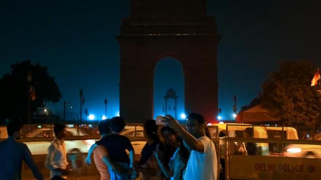 Visitors take selfies at India Gate, which went dark for Earth Hour 2018. To observe the hour, lights at Delhi monuments were switched off between 8.30 pm and 9.30 pm on Saturday, March 24. (Photo: Amal KS/HT) Visitors take selfies at India Gate, which went dark for Earth Hour 2018. To observe the hour, lights at Delhi monuments were switched off between 8.30 pm and 9.30 pm on Saturday, March 24. (Photo: Amal KS/HT)