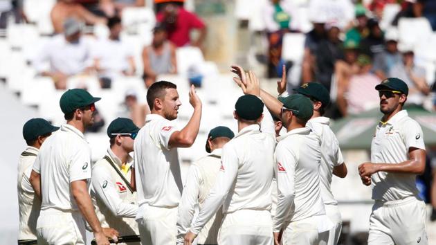 For visitors, Josh Hazelwood, Pat Cummins and Nathan Lyon took three wickets each. (AFP)