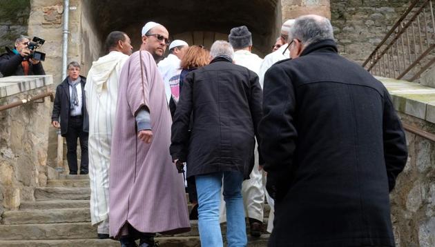 Muslim men (L) and other mourners arrive at the Saint Etienne Church in Trebes in southwest France for a service of remembrance on March 25, 2018, two days after a man carried out an attack in which four people were killed. (AFP Photo) Muslim men (L) and other mourners arrive at the Saint Etienne Church in Trebes in southwest France for a service of remembrance on March 25, 2018, two days after a man carried out an attack in which four people were killed. (AFP Photo)