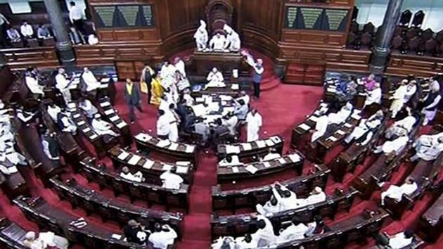 Opposition members protest during the ongoing budget session of Rajya Sabha, at Parliament House, in New Delhi.(PTI file photo)