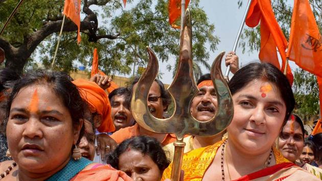 West Bengal BJP Mahila Morcha Chief Locket Chatterjee holds a 'trishul' during a religious procession to celebrate Ram Navami in Birbhum on Sunday.(PTI Photo)