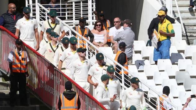 Australia players arrive before the start of play on Day 4 of the third Test against South Africa in Cape Town on Sunday.(REUTERS)