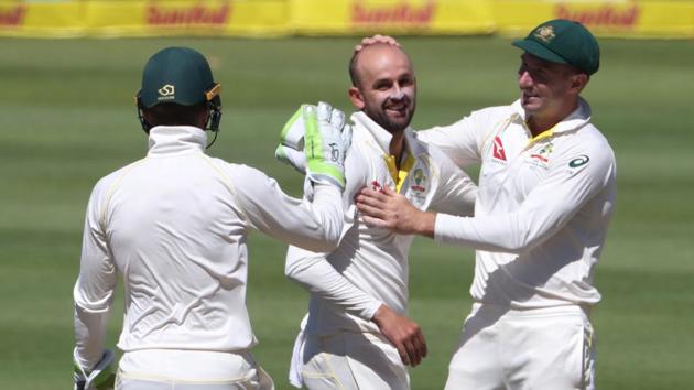 A rare highlight for the tourists saw Nathan Lyon collect his 300th Test wicket. (REUTERS)