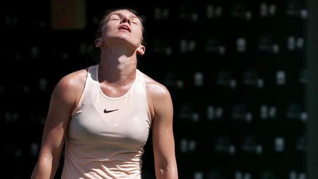 Simona Halep of Romania reacts after losing against Agnieszka Radwanska of Poland (not pictured) on Day 5 of the Miami Open at Tennis Center at Crandon Park. (USA TODAY Sports) Simona Halep of Romania reacts after losing against Agnieszka Radwanska of Poland (not pictured) on Day 5 of the Miami Open at Tennis Center at Crandon Park. (USA TODAY Sports)