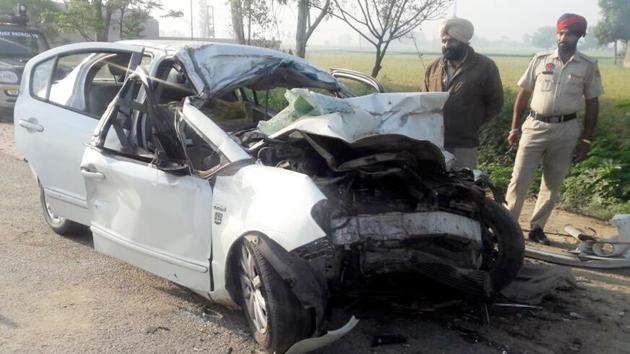 The damaged car after the accident near Umranangal village on the Amritsar-Jalandhar highway on Sunday. (HT Photo) The damaged car after the accident near Umranangal village on the Amritsar-Jalandhar highway on Sunday. (HT Photo)