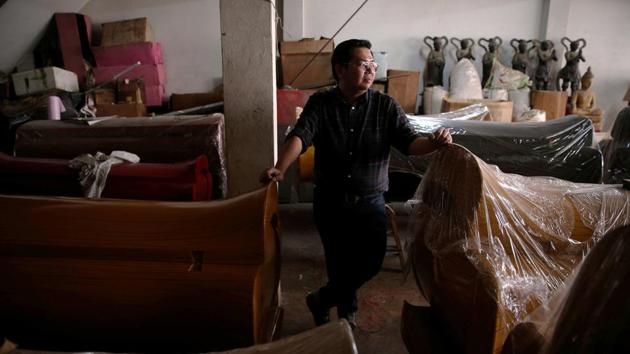 Professionally, Assadayut has a more unassuming role running a business selling coffins in Bangkok’s Chinatown. “Natalia is a role model for many other Chinese sons still living in the closet,” Assadayut said. (REUTERS) Professionally, Assadayut has a more unassuming role running a business selling coffins in Bangkok’s Chinatown. “Natalia is a role model for many other Chinese sons still living in the closet,” Assadayut said. (REUTERS)