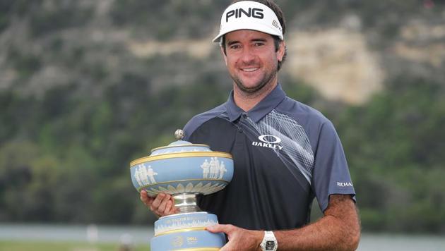 Bubba Watson poses with the trophy after winning the WGC Match-Play Championship on Sunday.(AFP)