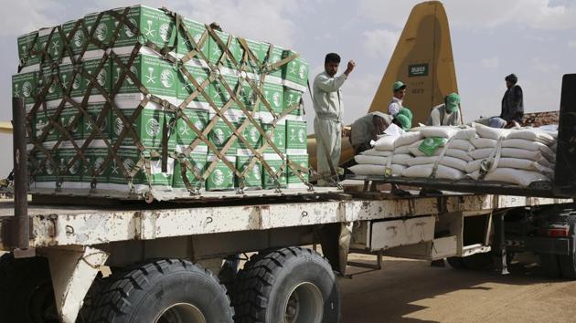 Relief workers unload aid carried into Yemen by the Saudi military in Marib, Yemen. (AP File Photo) Relief workers unload aid carried into Yemen by the Saudi military in Marib, Yemen. (AP File Photo)