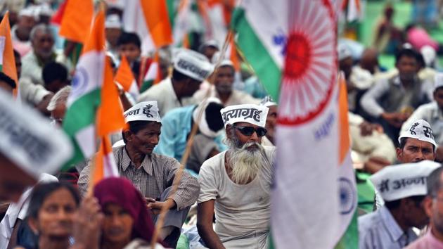Protesters at Anna Hazare’s hunger strike at Ramlila Maidan on Monday. Hazare, who had grabbed headlines seven years ago with his India Against Corruption movement at Ramlila Maidan, had returned to the protest venue on Friday to launch a fresh agitation. (Raj K Raj/HT Photo) Protesters at Anna Hazare’s hunger strike at Ramlila Maidan on Monday. Hazare, who had grabbed headlines seven years ago with his India Against Corruption movement at Ramlila Maidan, had returned to the protest venue on Friday to launch a fresh agitation. (Raj K Raj/HT Photo)