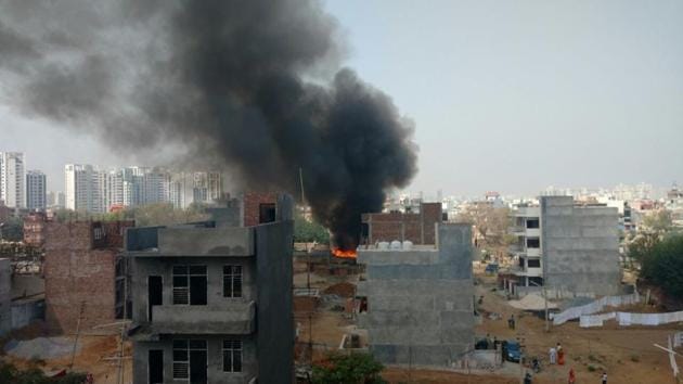 Fire broke out in a slum near Tigra village in Gurgaon on Monday. (HT Photo) Fire broke out in a slum near Tigra village in Gurgaon on Monday. (HT Photo)