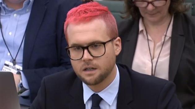 A video grab from footage broadcast by the UK Parliament's Parliamentary Recording Unit (PRU) shows Canadian data analytics expert Christopher Wylie who worked at Cambridge Analytica appears as a witness before the Digital, Culture, Media and Sport Committee of members of the British parliament at the Houses of Parliament in central London on March 27, 2018 .(AFP)