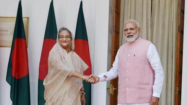 Prime Minister Narendra Modi shakesh hands with his Bangladeshi counterpart Sheikh Hasina before a meeting at Hyderabad house in New Delhi. (PTI File Photo) Prime Minister Narendra Modi shakesh hands with his Bangladeshi counterpart Sheikh Hasina before a meeting at Hyderabad house in New Delhi. (PTI File Photo)