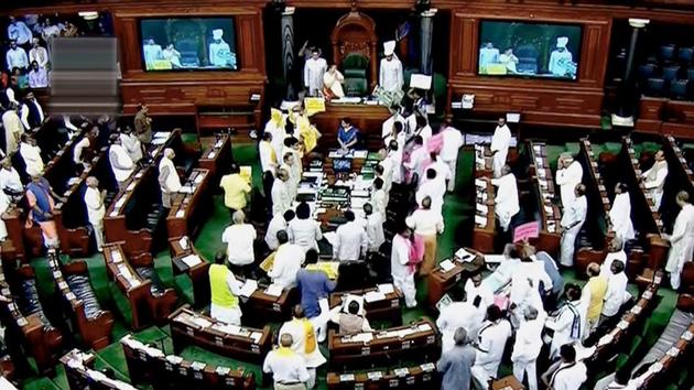 Opposition members protest during the ongoing Budget Session of Parliament in the Lok Sabha on Monday.(PTI Photo)