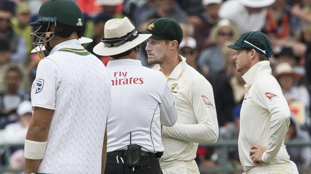 Cameron Bancroft, who later admitted to ball tampering, talks to the umpire on the third day of the third Test between South Africa and Australia at Newlands Stadium, in Cape Town.(AP)