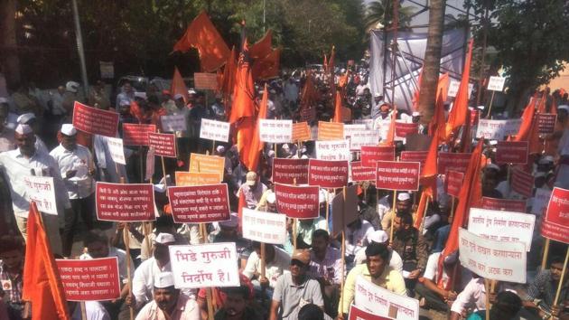 Supporters of Hindutva leader Sambhaji Bhide that gathered near PMC headquarters on Wednesday have also demanded that the police case against Samasta Hindu Aghadi leader Milind Ekbote be dismissed. (HT PHOTO) Supporters of Hindutva leader Sambhaji Bhide that gathered near PMC headquarters on Wednesday have also demanded that the police case against Samasta Hindu Aghadi leader Milind Ekbote be dismissed. (HT PHOTO)