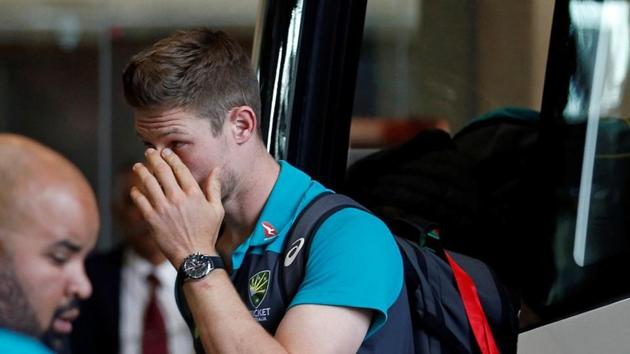 Australian cricketer Cameron Bancroft gestures as he arrives. (REUTERS)
