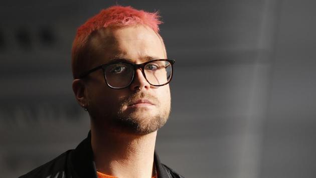 Canadian data analytics expert and whistle-blower Christopher Wylie poses for photographs outside a press conference in London on March 26, 2018.(AFP)