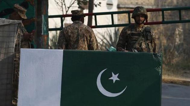 Pakistani army troops stand alert at an entrance to a prison in Haripur, Pakistan.(AP File Photo)