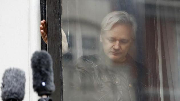 WikiLeaks founder Julian Assange closes a window after greeting supporters from the balcony of the Ecuadorian embassy in London. (AP File Photo) WikiLeaks founder Julian Assange closes a window after greeting supporters from the balcony of the Ecuadorian embassy in London. (AP File Photo)