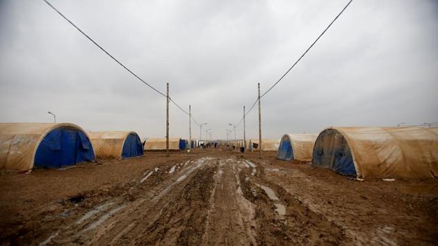 Ever since the Ahmad family fled in March 2017, this community of friends and relatives - a group of like-minded survivors of the battle for Mosul - had made life bearable. “It’s so hard saying goodbye,” Mohammed said, boxing up belongings in his tent in the Hammam al-Alil refugee camp. (Khalid Al-Mousily / REUTERS) Ever since the Ahmad family fled in March 2017, this community of friends and relatives - a group of like-minded survivors of the battle for Mosul - had made life bearable. “It’s so hard saying goodbye,” Mohammed said, boxing up belongings in his tent in the Hammam al-Alil refugee camp. (Khalid Al-Mousily / REUTERS)